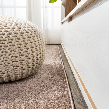 Haze Solid Low-Pile Area Rug Brown